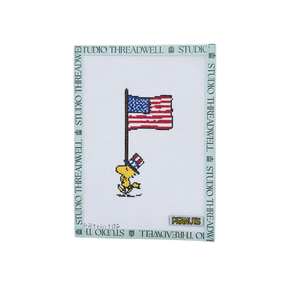 PEANUTS Patriotic: Woodstock Marching with Flag
